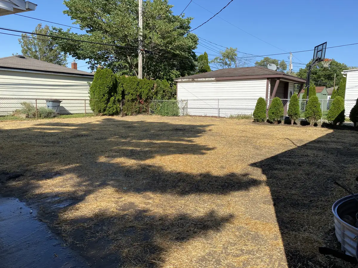 French drain installation with gravel and pipe system