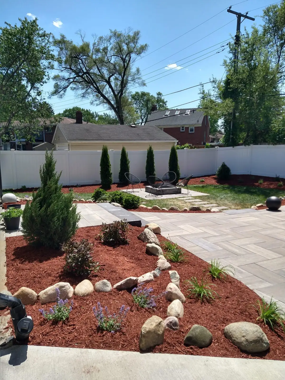 Freshly mulched landscape bed with clean edges in Metro Detroit