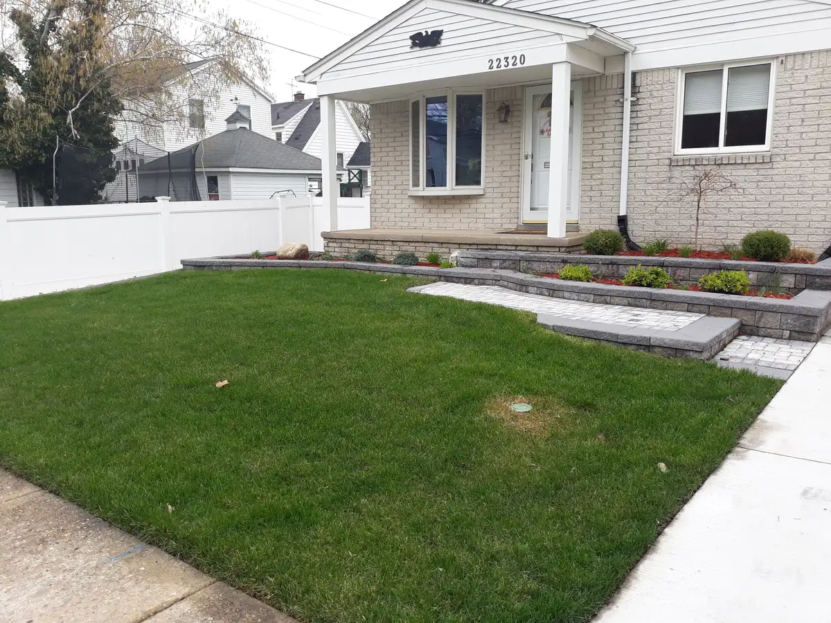 Landscape beds and lawn improvements for a Sterling Heights, Michigan home