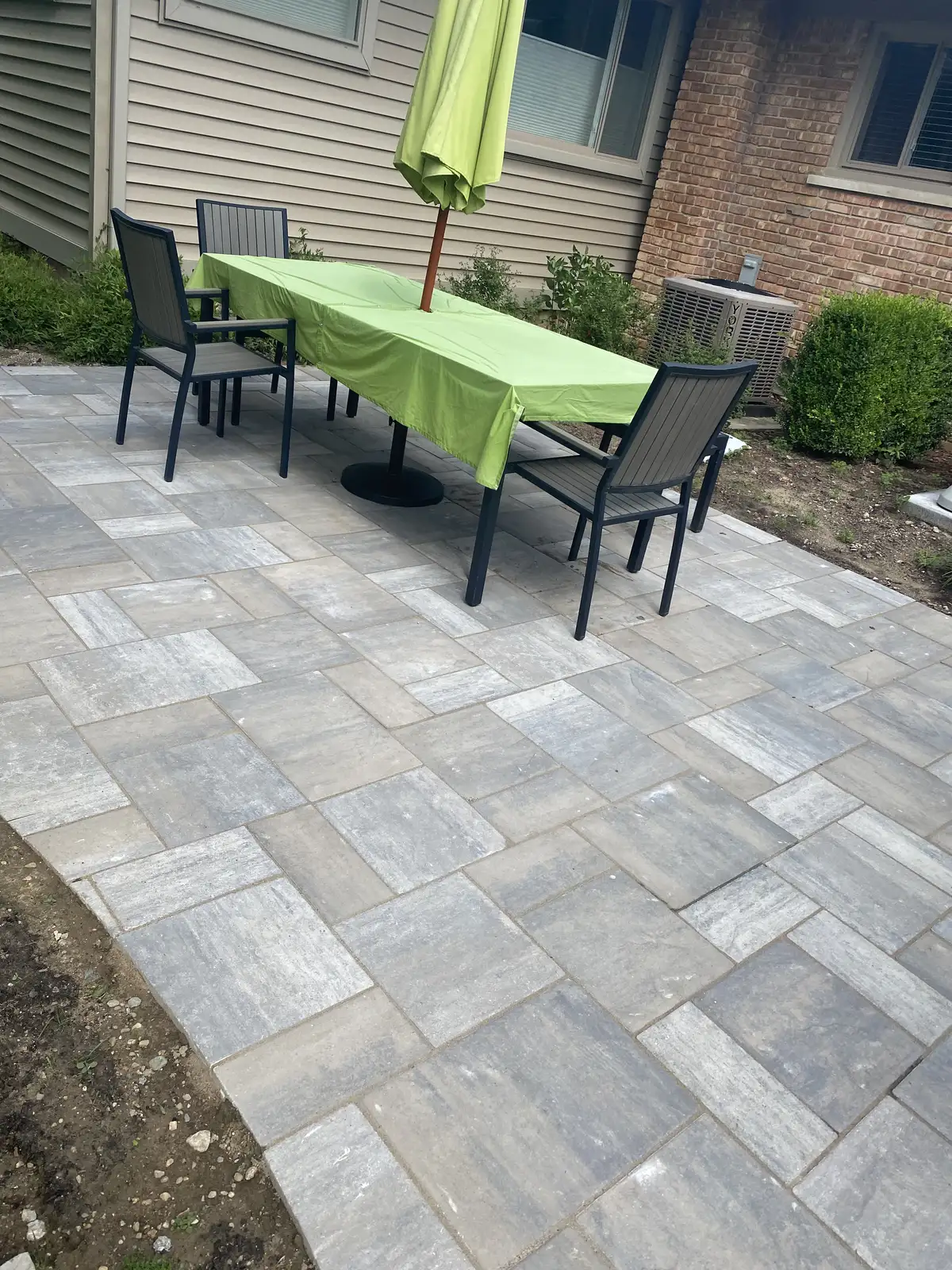 Hardscape installation with paver patio and retaining walls