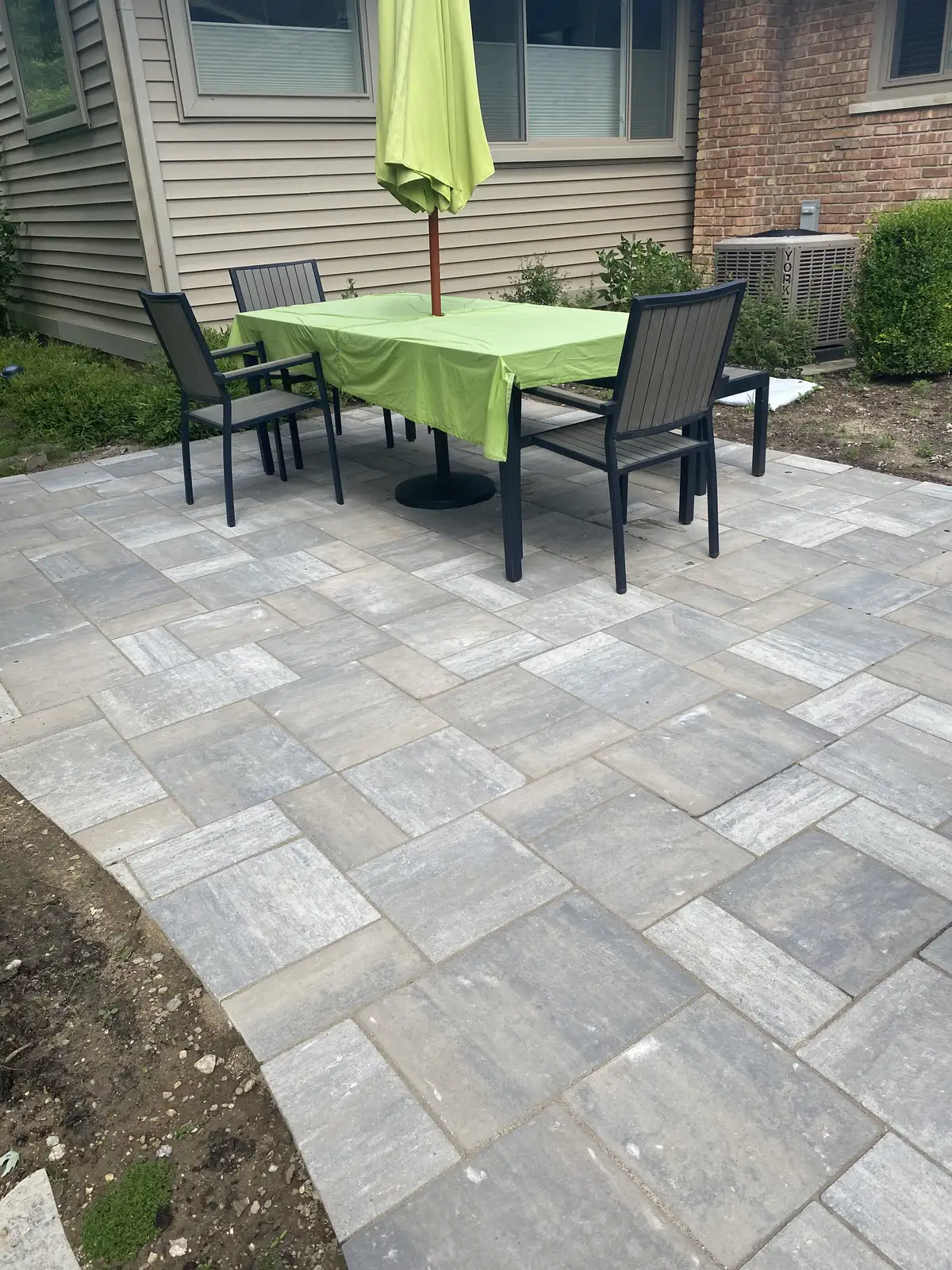 Multi-element hardscape project with patio and retaining wall
