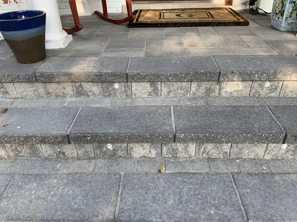 LED step lighting on paver steps maintained for year-round performance in Metro Detroit