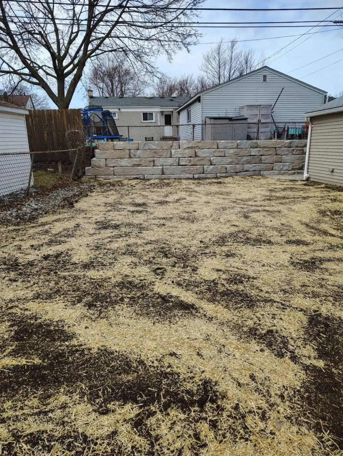 Cole's natural stone retaining wall installation in Metro Detroit
